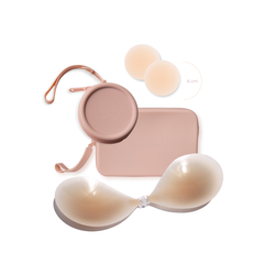 Product shot of sticky Light tint 6cm Headlight Hiders and Silicone Stick-on Bra and durable Silicone Travel Case for Silicone Stick-on Bras in Dusty Pink and information insert card with wear and care instructions, against a white background showing the thin edges of the Silicone Stick-on Bra