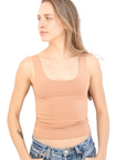Product shot NŪD Apparel Devon Long Double Layer Scoop, wide strap, perfect length and seamless, made of bamboo fabric produced in California, in Medium Nude on fair-skinned model paired with light-wash jeans, front shot