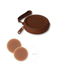 Product shot of reusable Dark tint 6cm Headlight Hiders and Silicone Travel Case for sticky Headlight Hiders in Dark Nude with a removable strap and zipper detail, against a white background showing the thin edges of the Headlight Hiders