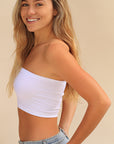 Product shot of Boob-eez Seamless Bandeau in White, strapless and seamless style, easy layering piece under blouses, tanks, and low-cut dresses, amazing basic , side shot
