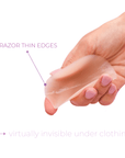 Product shot of hand holding our flexible and sticky Light tint Headlight Hider showing the razor thin edge,  explaining the Headlight Hiders are invisible underneath clothing because of the thin edge 