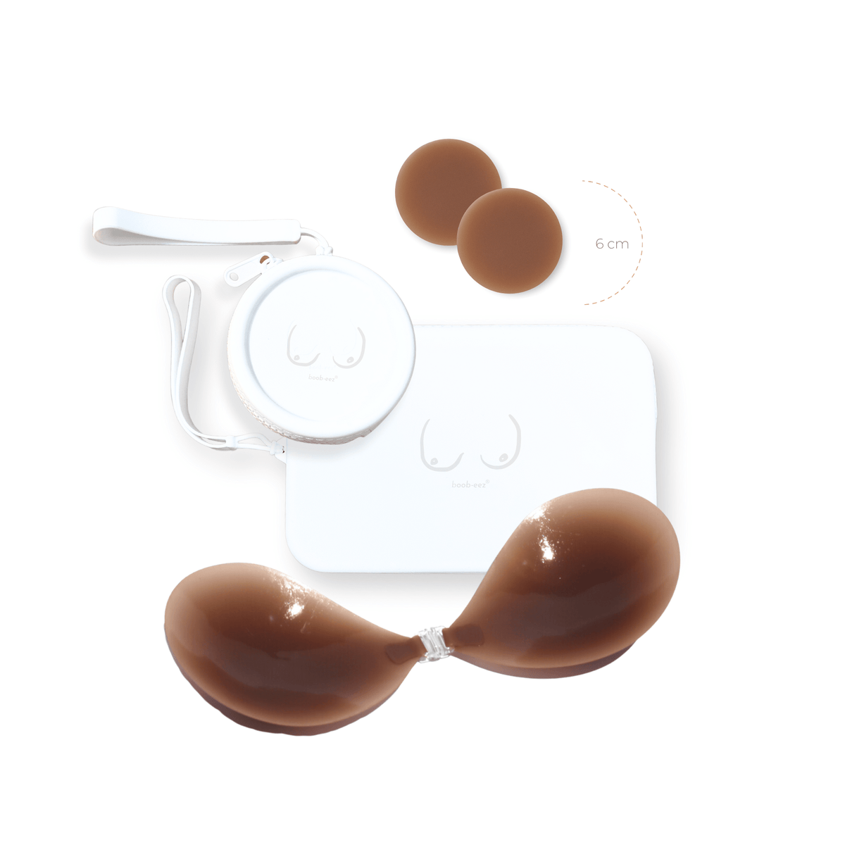 Product shot of reusable Dark tint 6cm Headlight Hiders and Silicone Travel Case for Headlight Hiders and Silicone Travel Case for a Stick-on Bra in White with a removable strap and zipper detail, against a white background showing the thin edges of the Headlight Hider