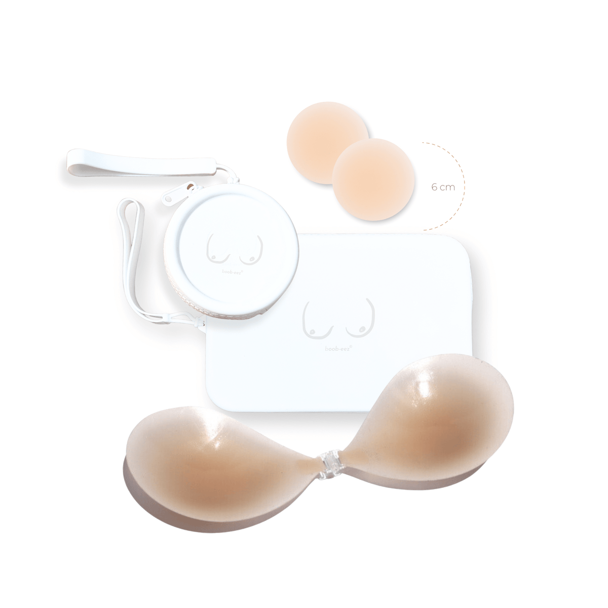 Product shot of reusable Light tint 6cm Headlight Hiders and Silicone Travel Case for Headlight Hiders and a Silicone Travel Case for a sticky Stick-on Bra in White with a removable strap and zipper detail, against a white background showing the thin edges of the Headlight Hiders