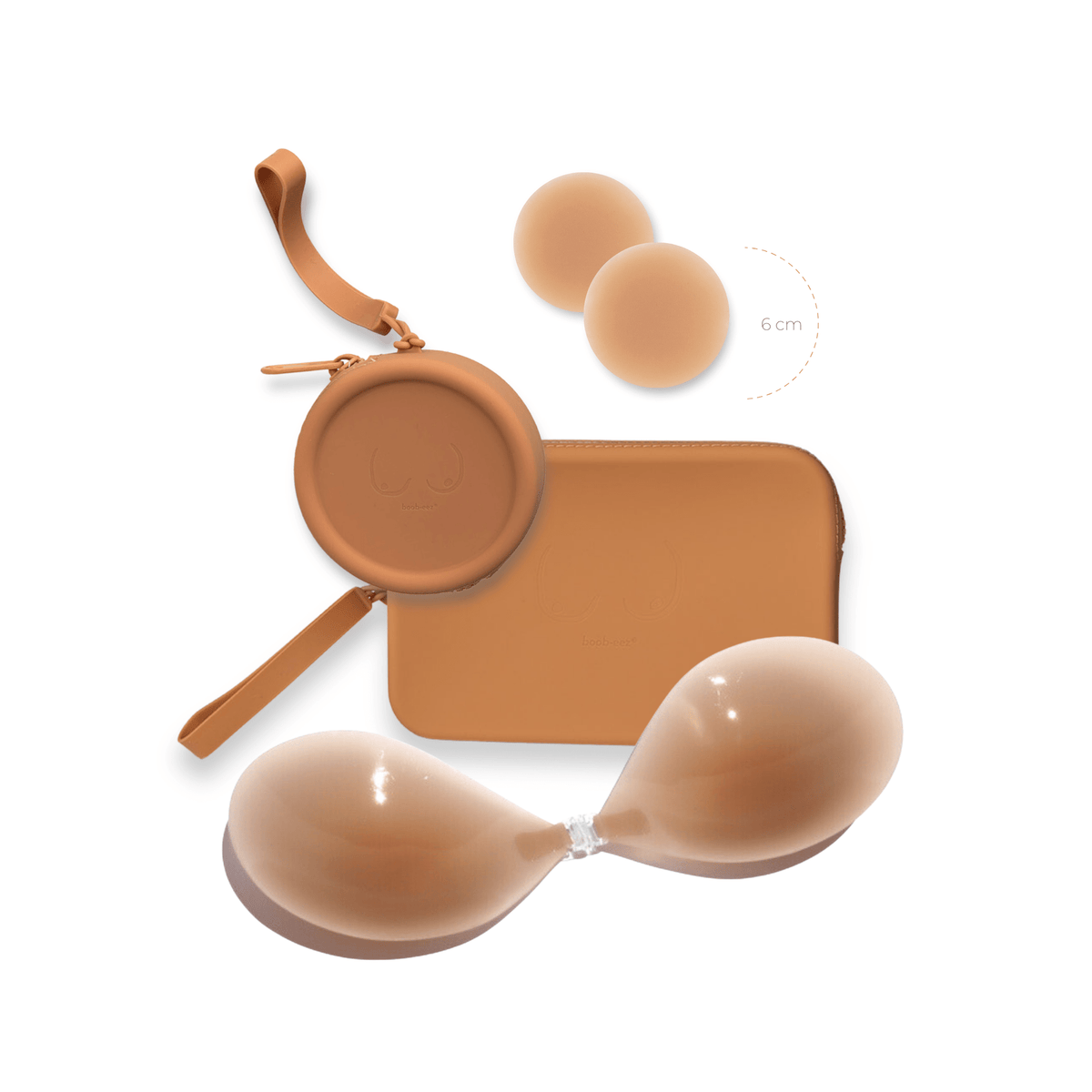 Product shot of reusable Medium tint 6cm Headlight Hiders and Silicone Travel Case for Headlight Hiders and a Silicone Travel Case for a sticky Stick-on Bra in Medium Nude with a removable strap and zipper detail, against a white background showing the thin edges of the Headlight Hiders