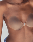 Product shot of Dark tint Silicone Stick-on Bra size A-cup on dark-skinned model, close-up shot showing the full Silicone Stick-on Bra, seamless, thin edges, and no extra bulk