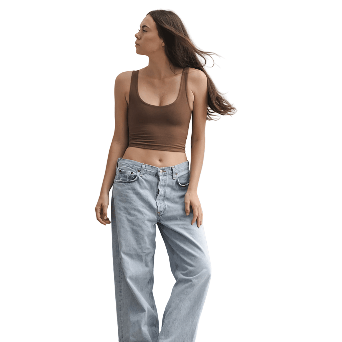 Product shot of NŪD Apparel Devon Double Layered Scoop Crop top, wide strap and seamless, made of bamboo fabric produced in California, in Dark Nude on fair-skinned model paired with light-wash jeans, front wide shot