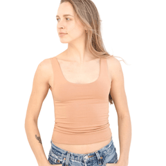 Product shot NŪD Apparel Devon Long Double Layer Scoop, wide strap, perfect length and seamless, made of bamboo fabric produced in California, in Medium Nude on fair-skinned model paired with light-wash jeans, front shot