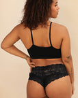 Product shot of Boob-eez Lace Edge Bralette in Black, with adjustable and convertible straps, wear as racerback or front to back, back shot